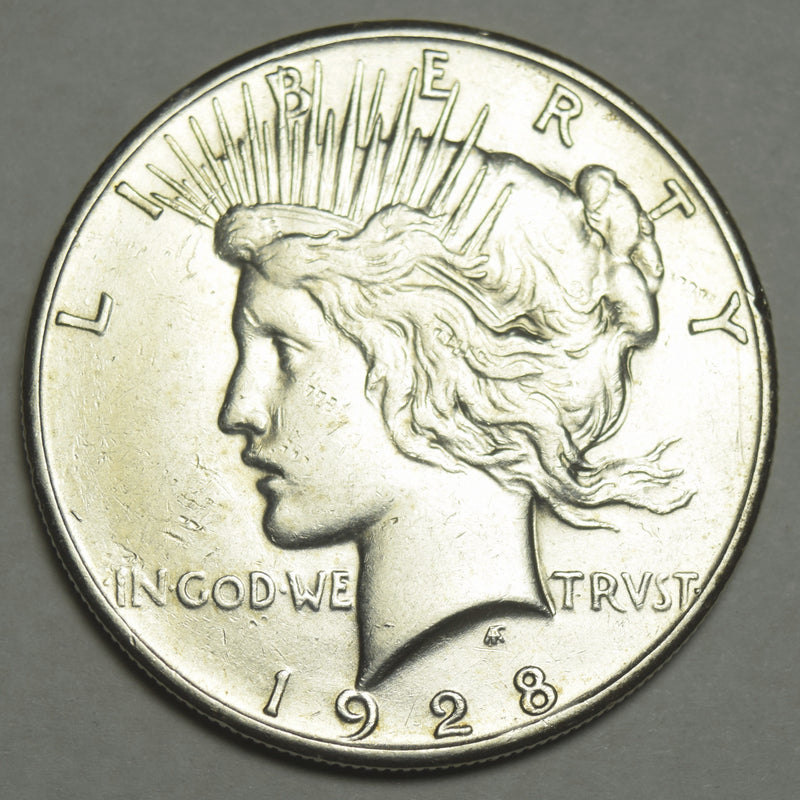 1928 Peace Dollar . . . . Choice About Uncirculated