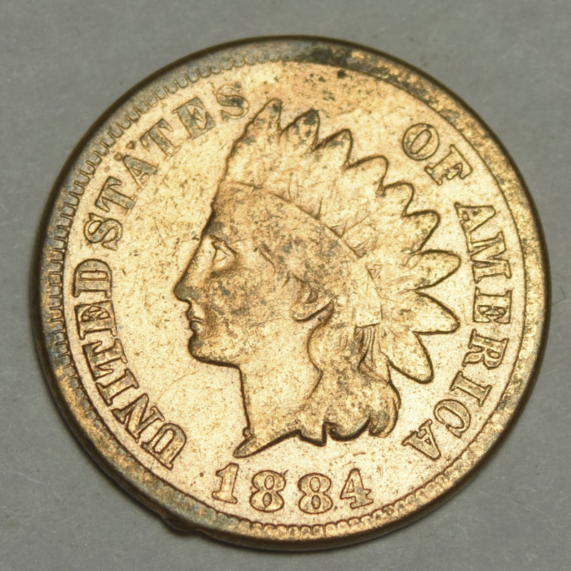1884 Indian Cent . . . . VG/Fine coating on coin