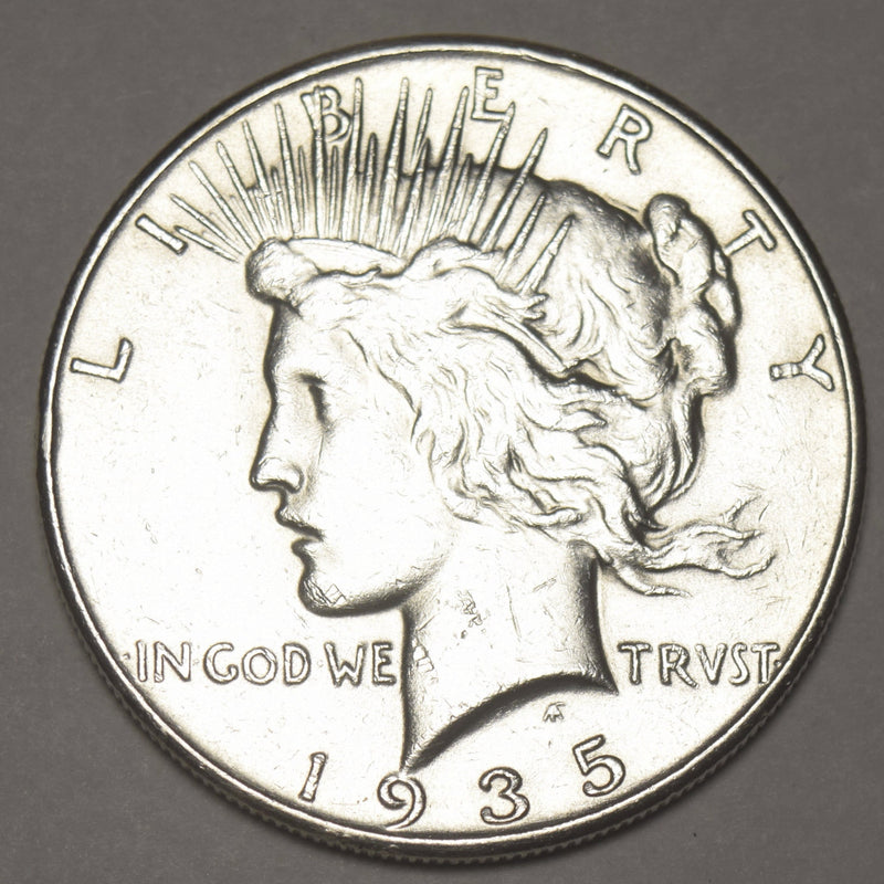 1935 Peace Dollar . . . . Choice About Uncirculated