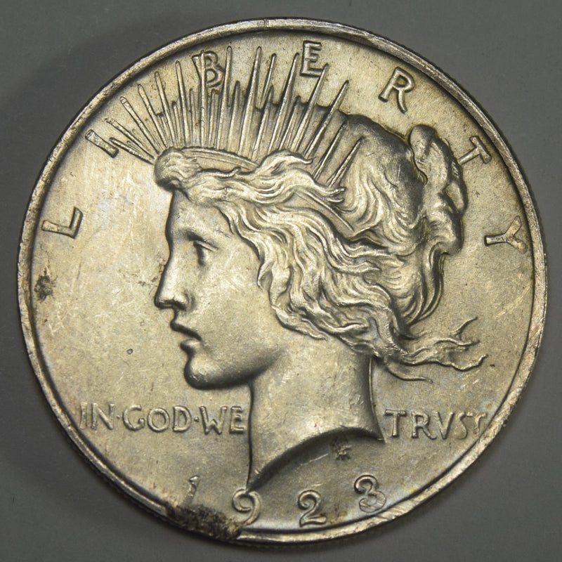 1923 Peace Dollar . . . . BU small clip