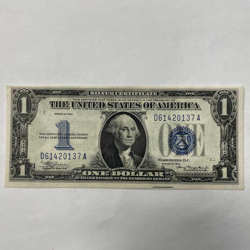 $1.00 1934 -Funny Back- Silver Certificate . . . . Choice Crisp Uncirculated