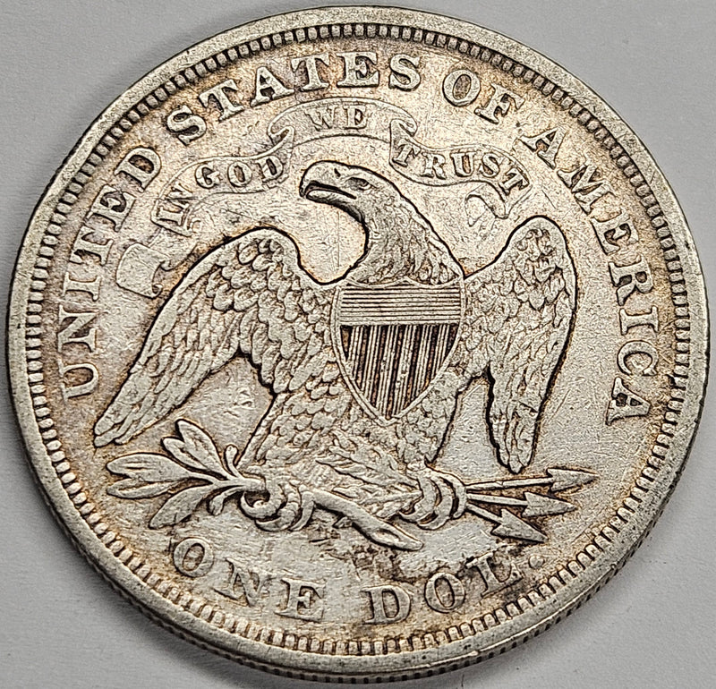 1870 Seated Liberty Dollar . . . . VF/XF