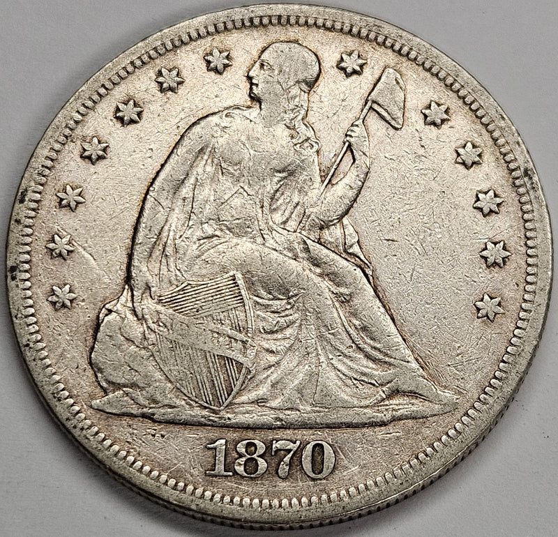 1870 Seated Liberty Dollar . . . . VF/XF