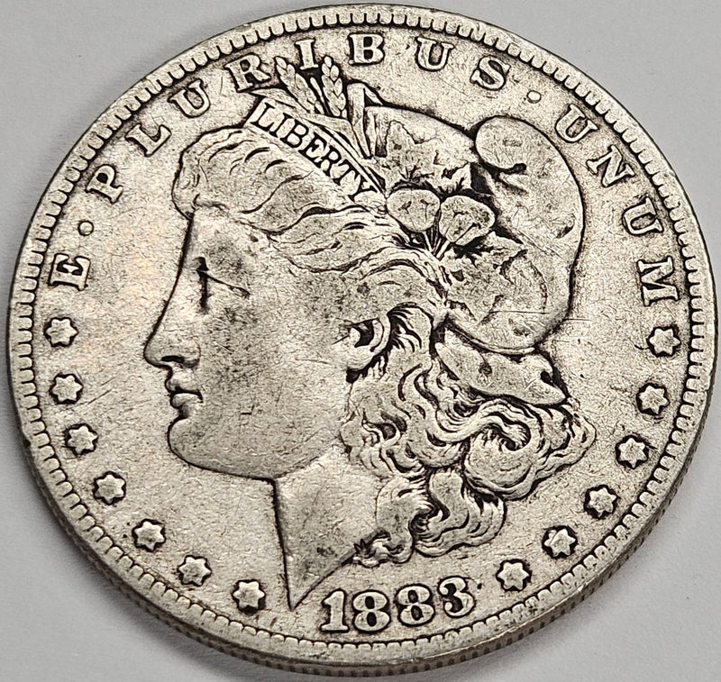 1883 Morgan Dollar . . . . Fine
