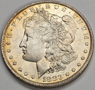 1883-O Morgan Dollar Choice BU Golden Toning