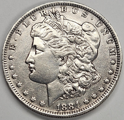 1884-O Morgan Dollar AU polished