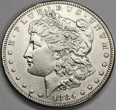 1884-S Morgan Dollar AU reverse hits