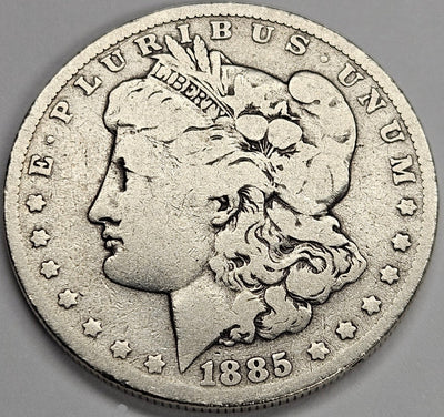 1885-O Morgan Dollar Very Good