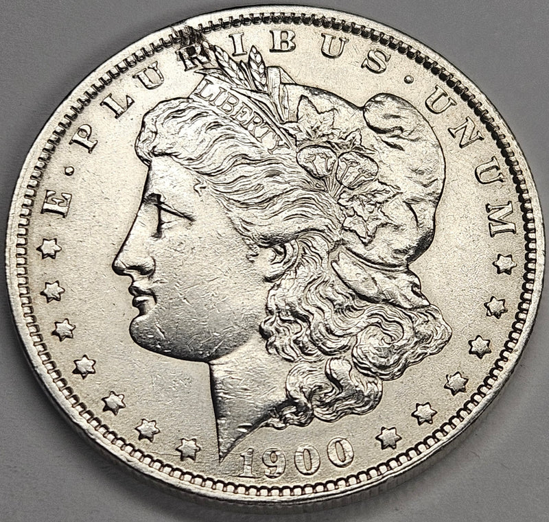 1900-O Morgan Dollar . . . . Choice About Uncirculated