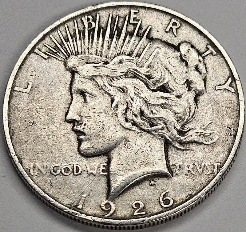 1926-D Peace Dollar . . . . VF rim hits