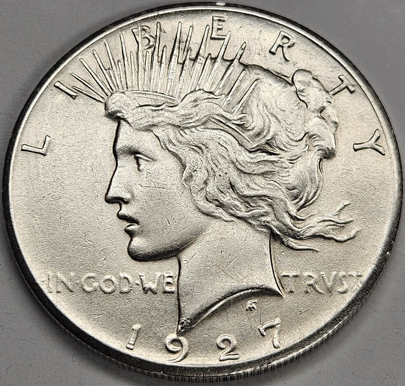 1927 Peace Dollar . . . . About Uncirculated