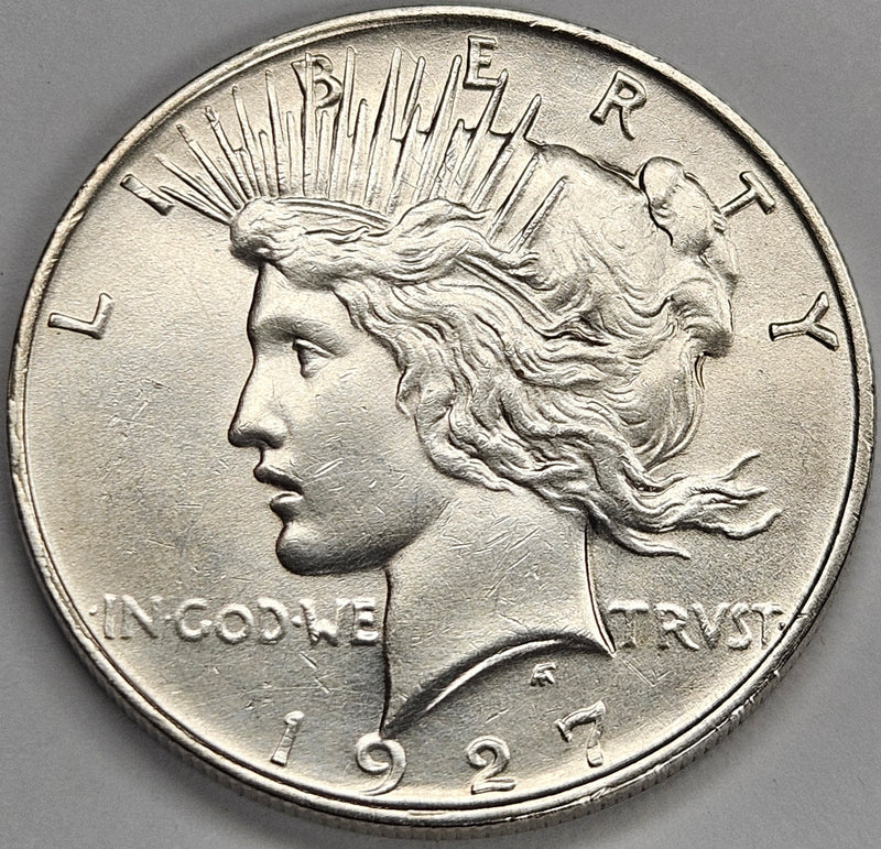 1927-D Peace Dollar . . . . BU lightly cleaned