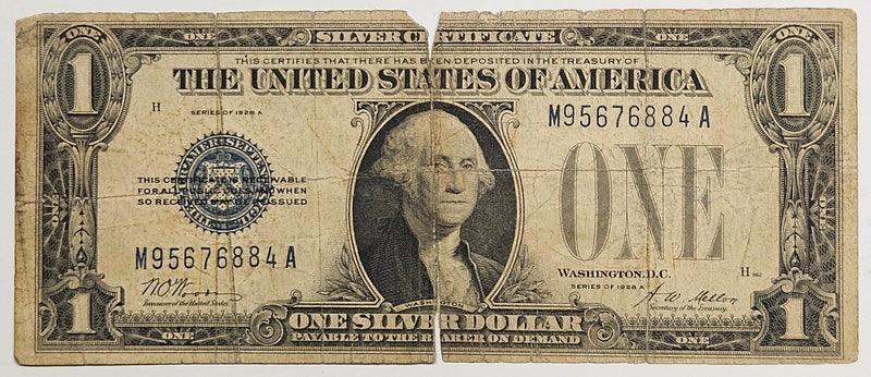 $1.00 1928 A Silver Certificate . . . . VG rough torn