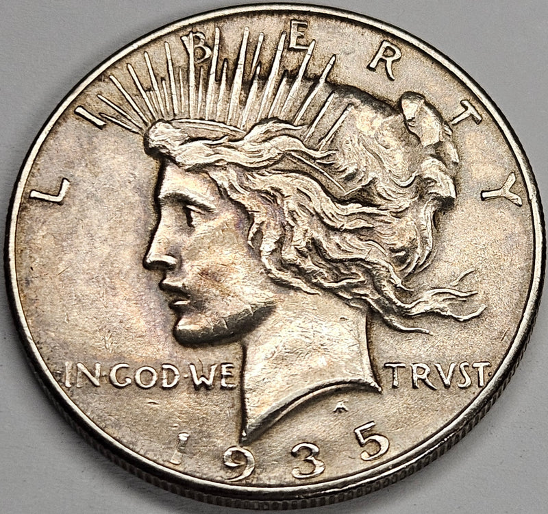 1935 Peace Dollar . . . . AU polished