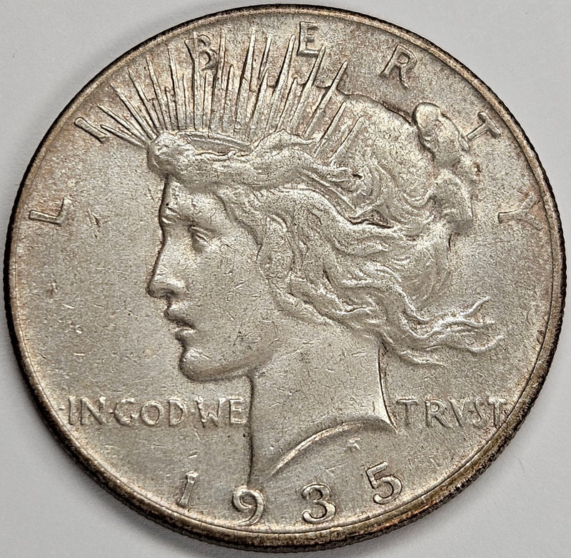 1935 Peace Dollar . . . . Choice About Uncirculated