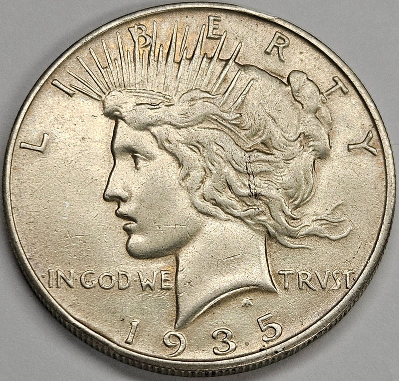 1935-S Peace Dollar AU rim bumps