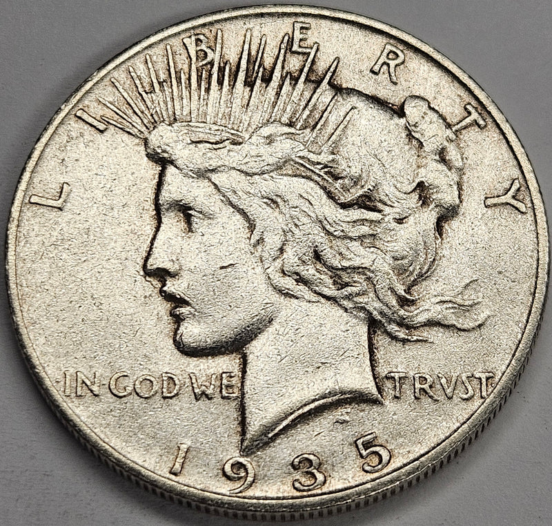 1935-S Peace Dollar . . . . XF scratches rough