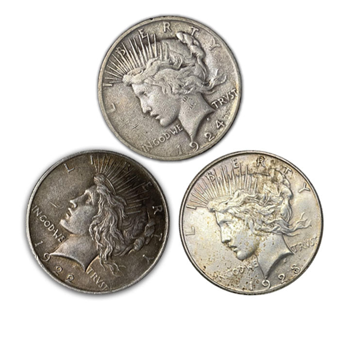 3 Mixed Dates Silver Peace Dollars . . . . Fine or better Condition