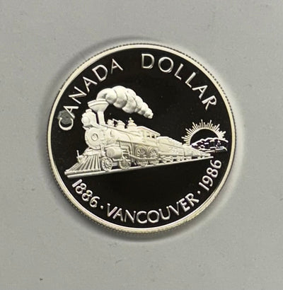 1986 Silver Canadian Commemorative Dollar . . . . Gem Proof