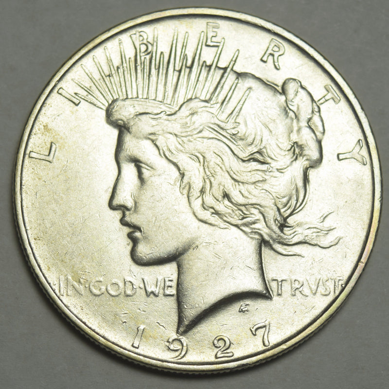1927-D Peace Dollar . . . . Choice About Uncirculated