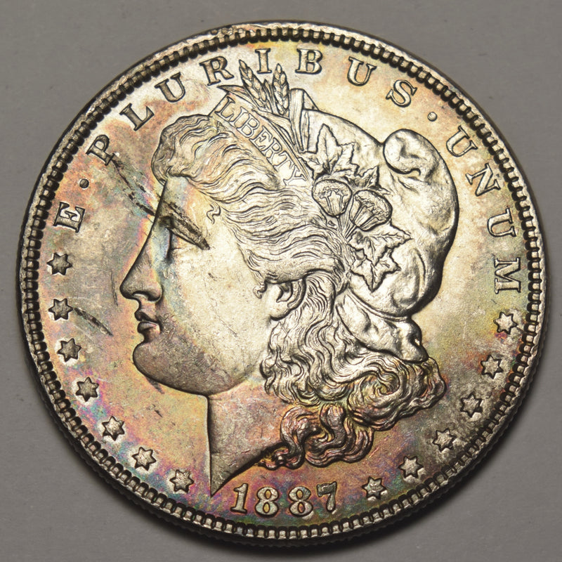 1887 Morgan Dollar . . . . Choice BU+ Color!