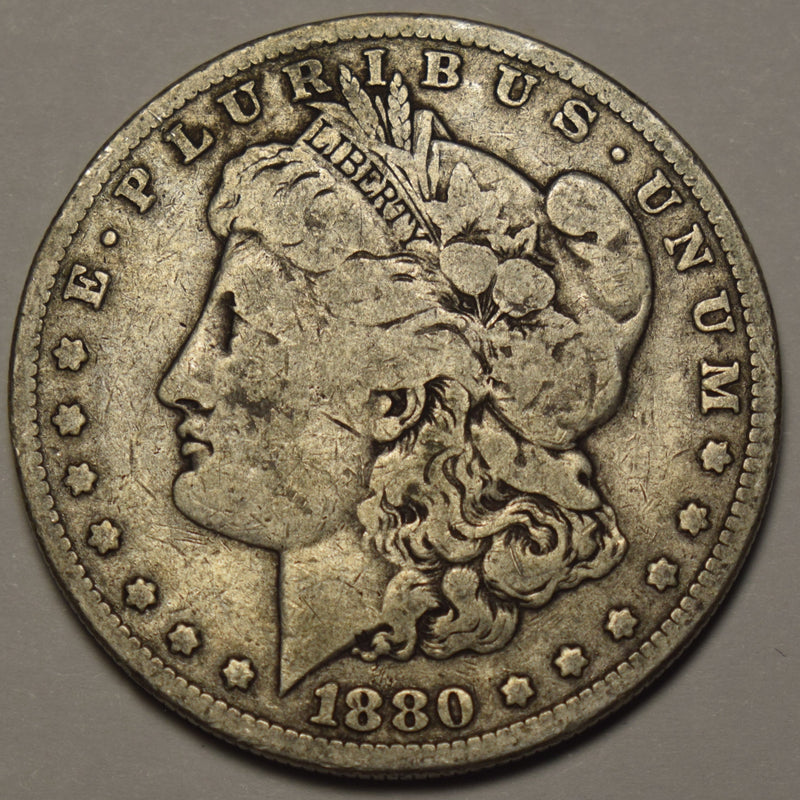 1880-O Morgan Dollar . . . . Fine