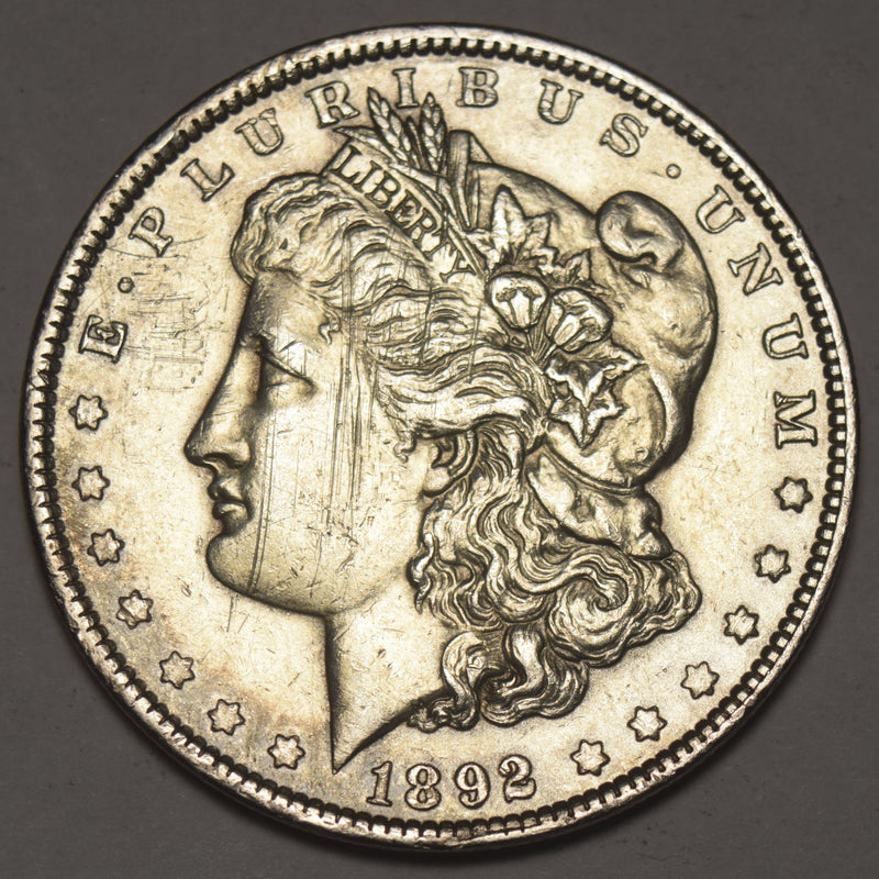 1892 Morgan Dollar . . . . Uncirculated obverse scratches