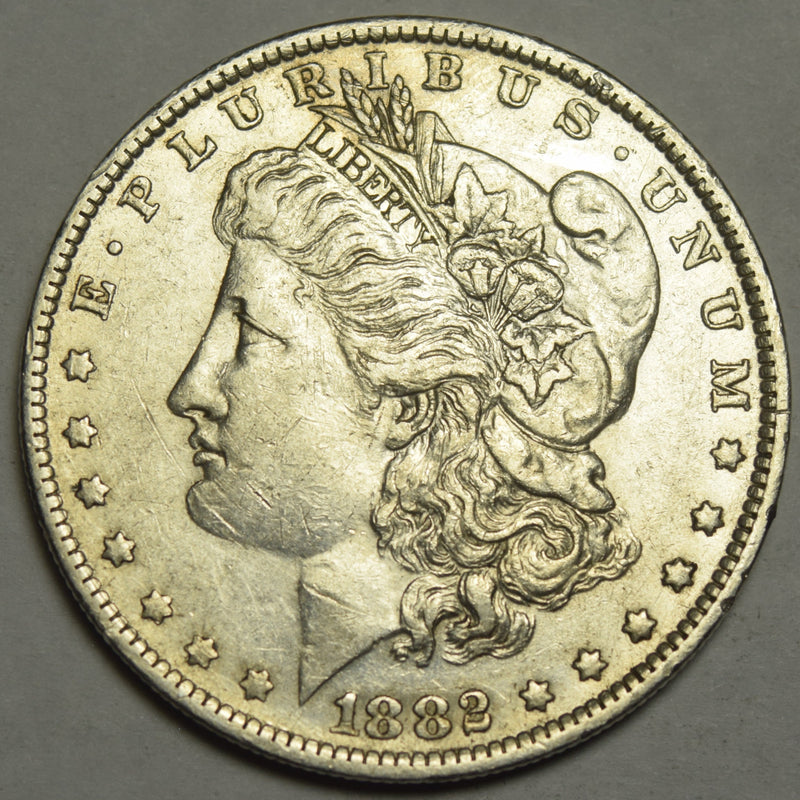 1882-O/S Morgan Dollar . . . . Choice About Uncirculated
