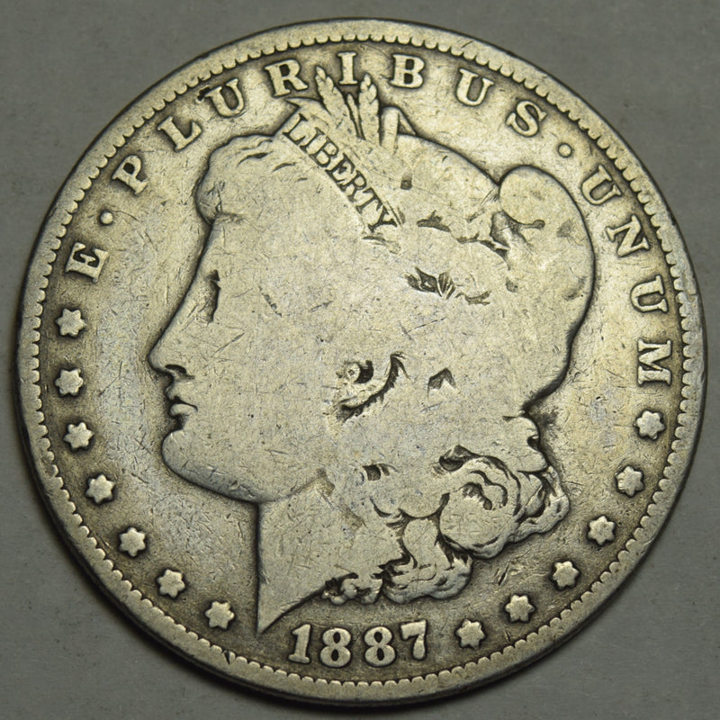 1887-O Morgan Dollar . . . . Very Good