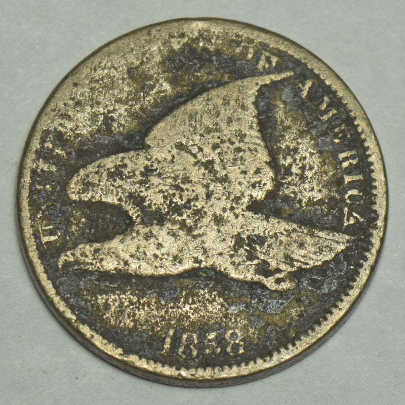 1858 Large Letters Flying Eagle Cent . . . . Good badly corroded