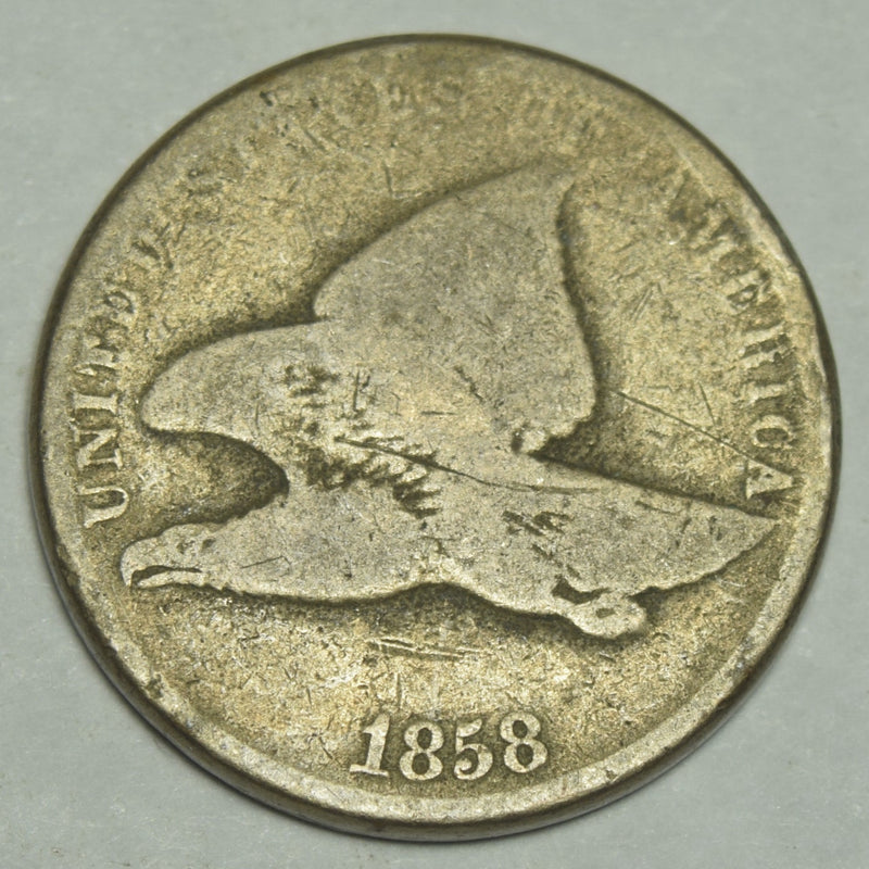 1858 Small Letters Flying Eagle Cent . . . . About Good