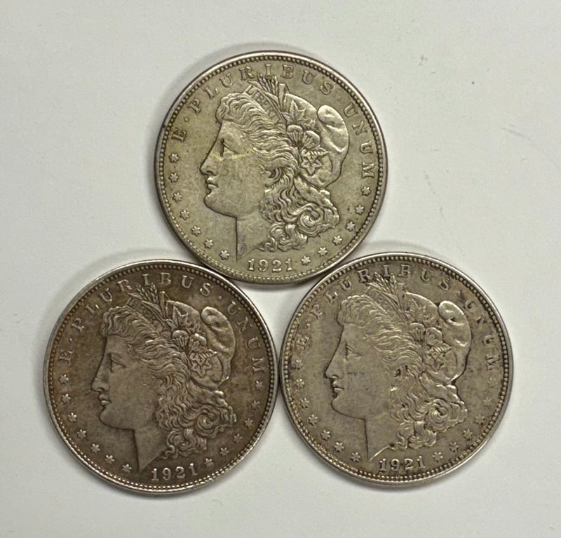 1921-PDS Morgan Dollars . . . . VF or Better